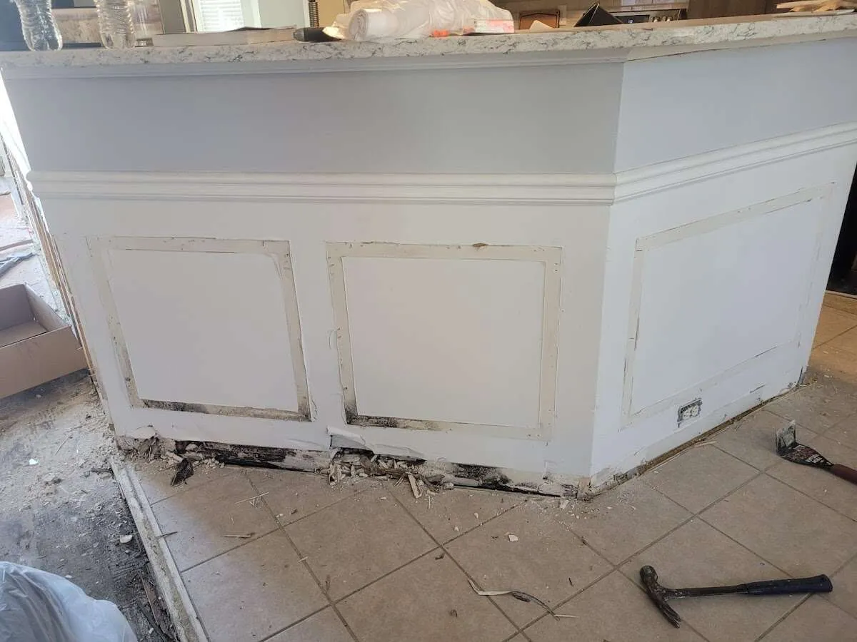Water damage and mold on kitchen during Storm Damage Restoration in El Cerro Mission